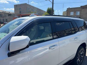 Window Deflectors 4pcs Set With Black Trim Chevrolet Tahoe 2021-2025 Wellvisors 3-847CH035