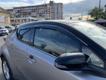 Window Deflectors 4pcs Set With Black Trim Toyota C-HR 2018-2022 Wellvisors 3-847TY051