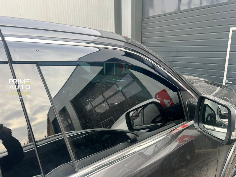 Дефлекторы окон к-т 4 шт с хромированным молдингом Ram 1500 TRX 2019-2024 Wellvisors 3-847DG009 3-847DG009. фото